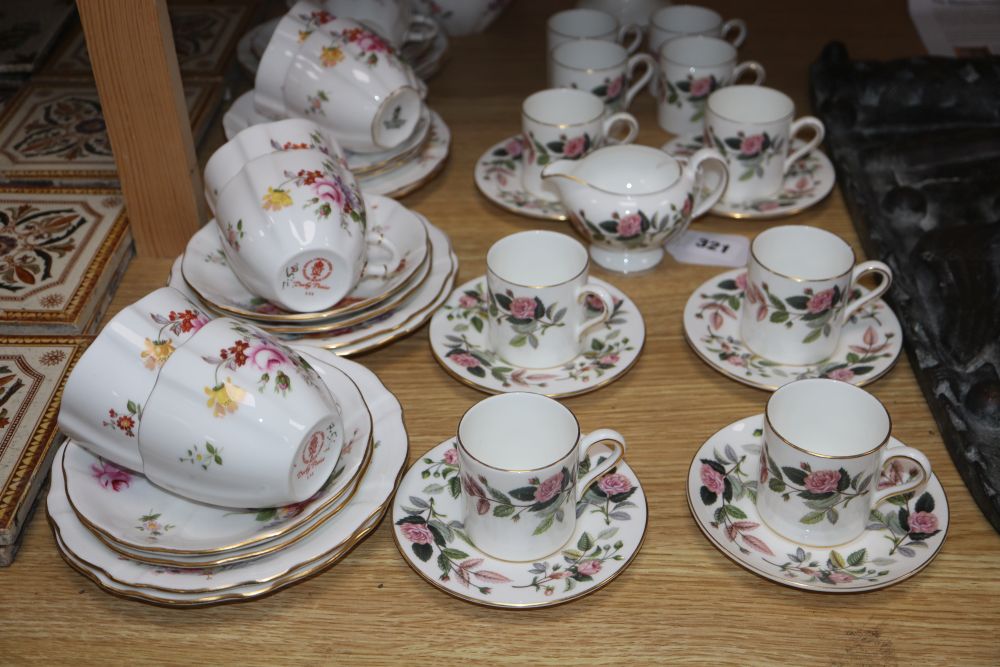 A Royal Crown Derby Derby Posies 25-piece part tea service and a Wedgwood Hathaway Rose part coffee service,